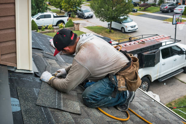 Professional Gutter Installation technician working in Lewisville, TX